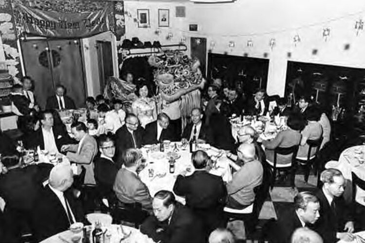 An old photo of the Kwan Lion Dance for Chinese New Year.